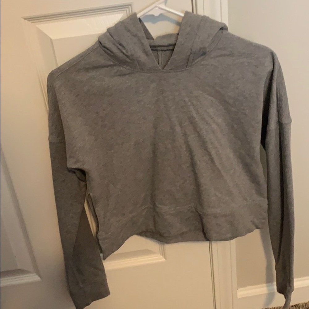 A grey crop top jacket